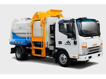 Camião/Caminhão compactador de lixo com carregamento lateral