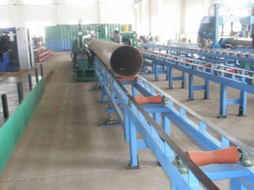 Sistema de transporte de tubos para máquina de corte