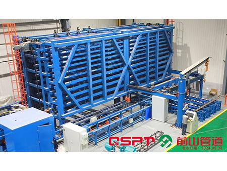 Sistema de estantes de tubos automatizado para pré-fabricação de carretéis de tubos