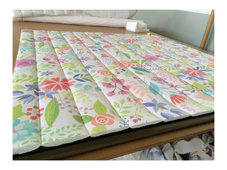 Máquina de bordar e matelar ultrassônicas