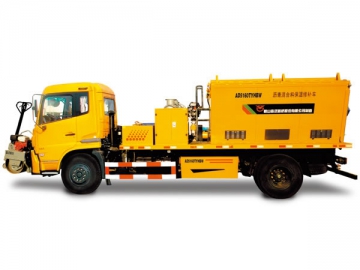 Caminhão espargidor de asfalto <br/><small>(com rolo compactador vibratório e martelo hidráulico)</small>